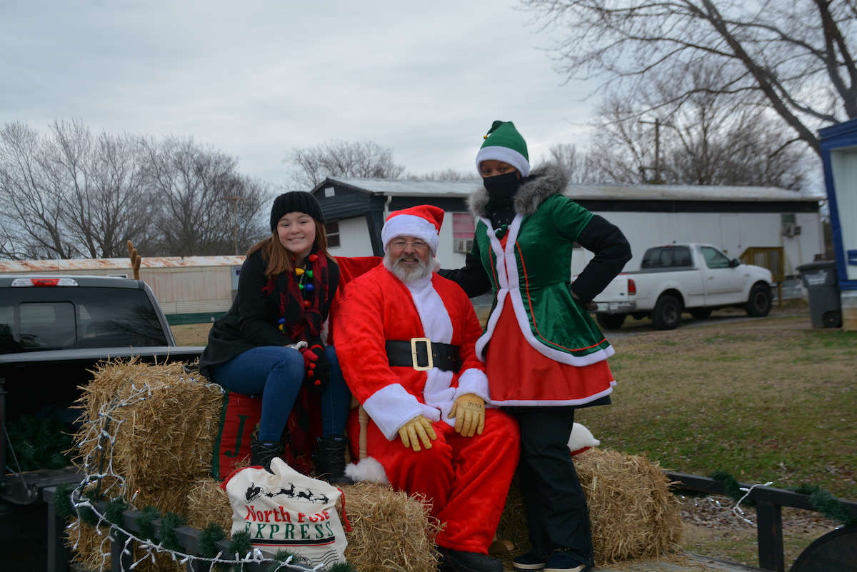 Mobile Santa and his helpers on their trailer.