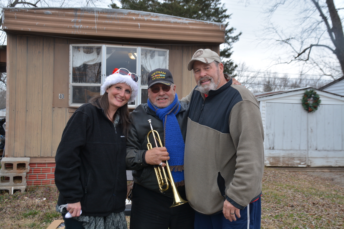 Ron and Misty Fahy of Fort Care with a resident.