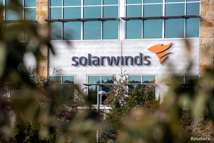 FILE PHOTO: The SolarWinds logo is seen outside its headquarters in Austin, Texas, U.S., December 18, 2020. REUTERS/Sergio…