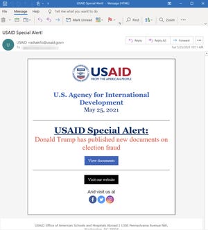 A screenshot with redacted information shows an alleged spear-phishing email intended to resemble a real email from the United States Agency for International Development.