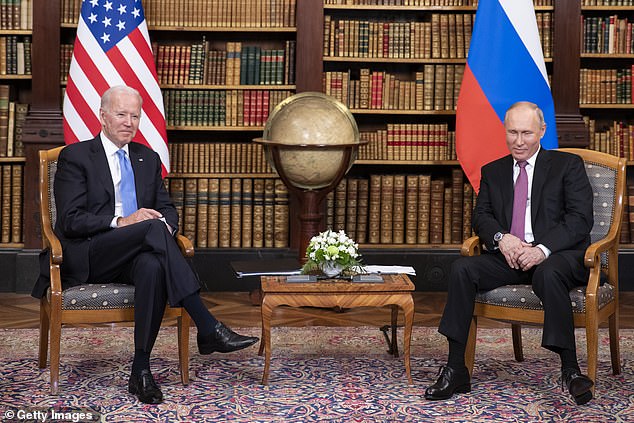 The Kremlin has failed to deny that the takedown of the websites used by Russian-based hacking group ReVil is tied to US President Joe Biden's pressure on Russian President Vladimir Putin. Biden and Putin pictured meeting at the Geneva Summit on June 16