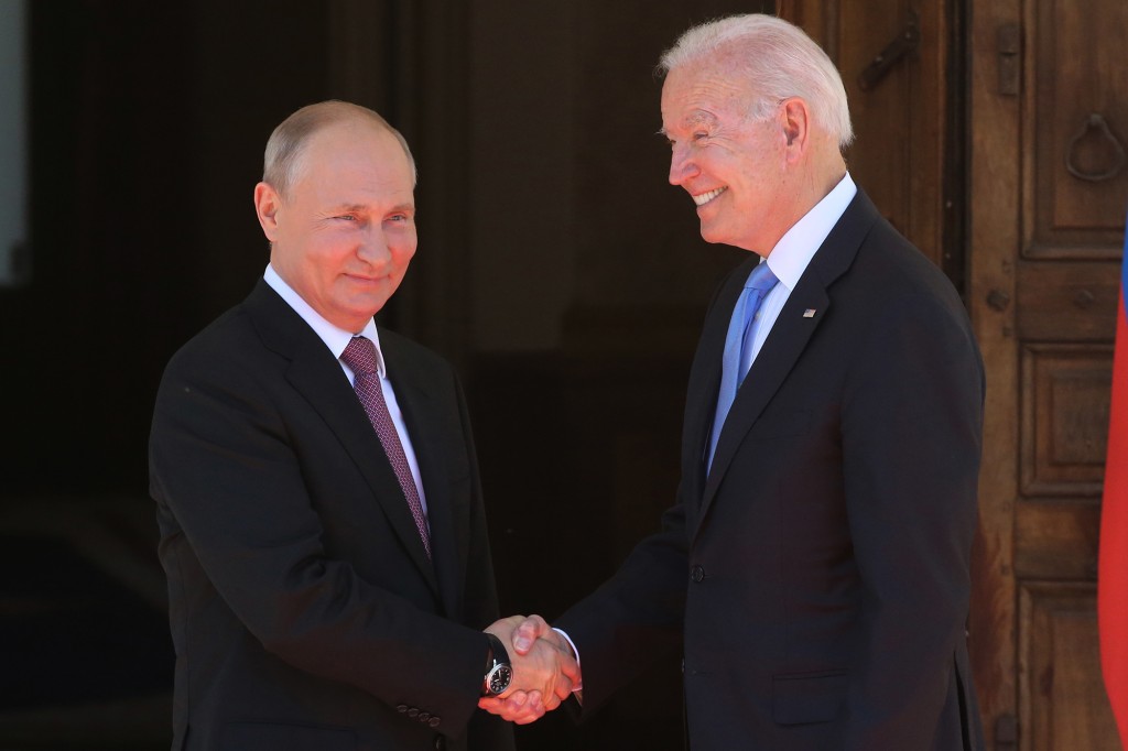 President Joe Biden greets Russian President Vladimir Putin during a US-Russia Summit in Geneva, Switzerland on June 16, 2021.