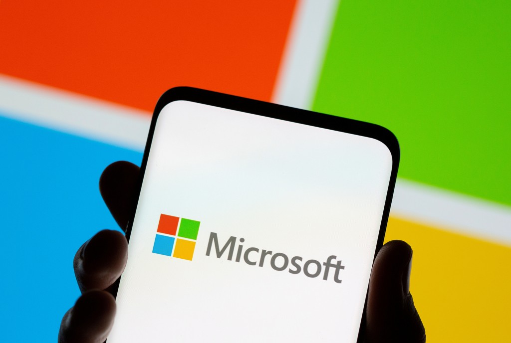 A smartphone displays the Microsoft logo in this illustration taken July 26, 2021.