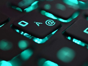 This file photo illustration picture taken on June 25, 2019 shows a close-up view of a computer keyboard.