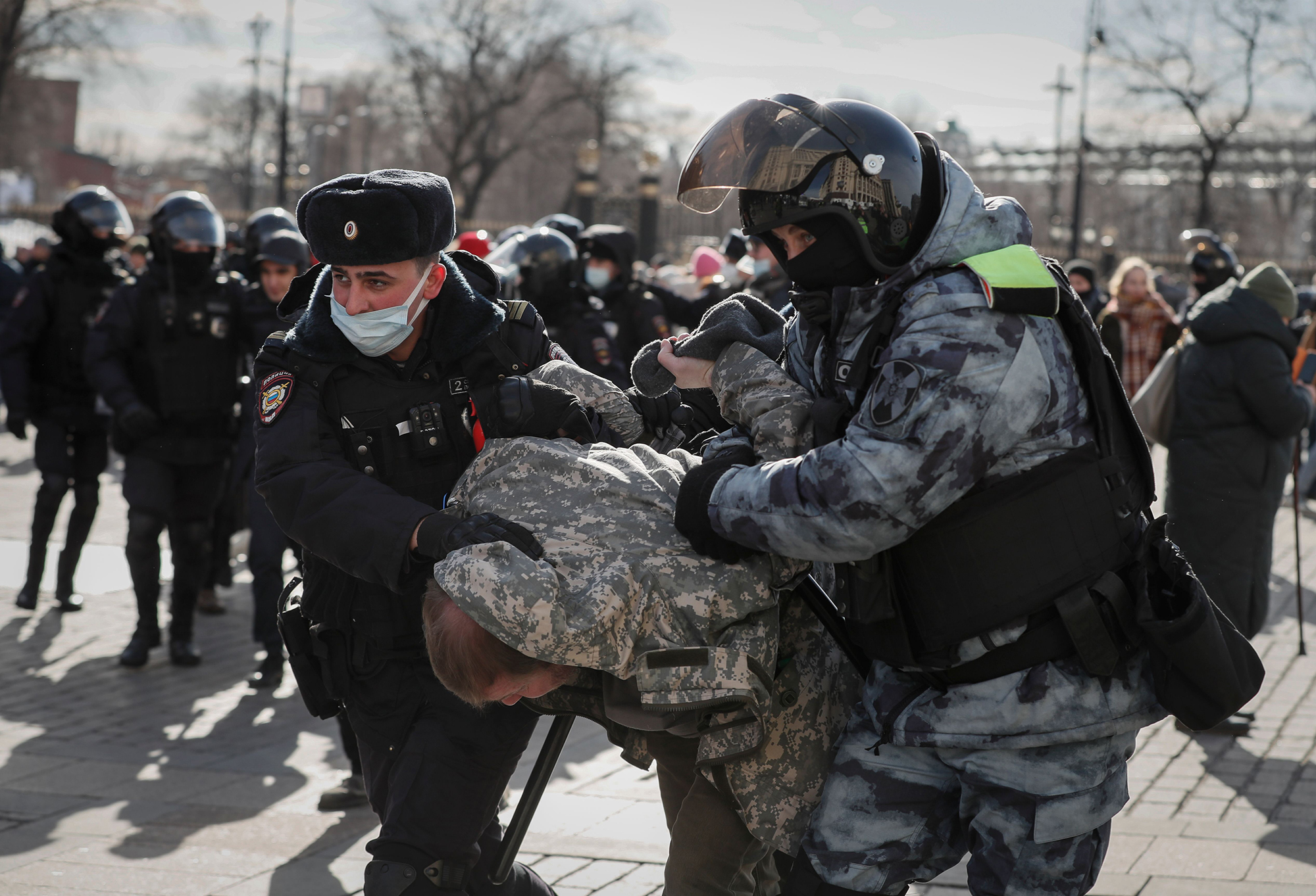 Russian police detain a protester in downtown Moscow on March 6. 