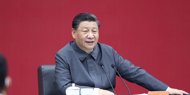 Chinese President Xi Jinping, also general secretary of the Communist Party of China Central Committee and chairman of the Central Military Commission, sits down with representatives of teachers and students at a symposium and delivers a speech during a visit to Renmin University of China in Beijing, capital of China, April 25, 2022. 