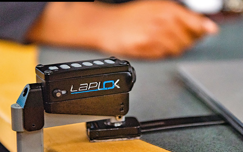 The LapLok systems can be used on any laptop, Mac, or tablet to protect it from theft in public spaces. // Courtesy of Techlok Solutions