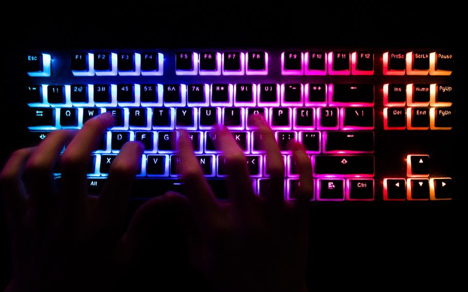 A back-lit computer keyboard. 