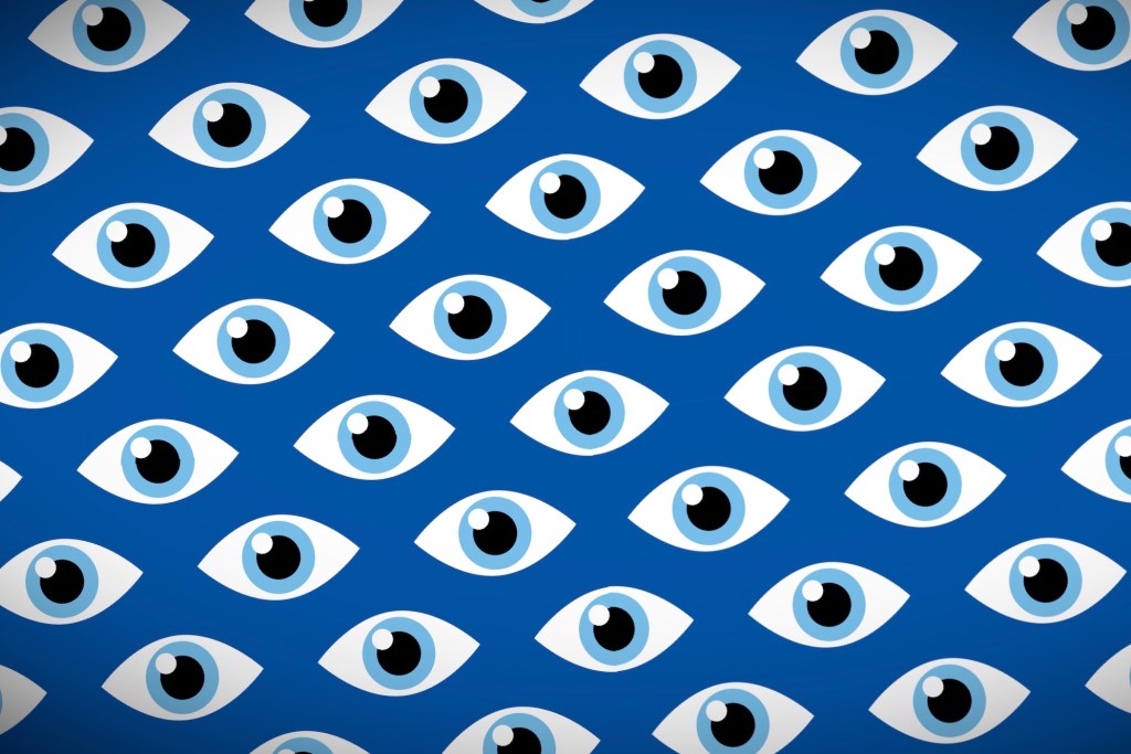 illustrated patterned eyes on a blue background with a darkened vignette